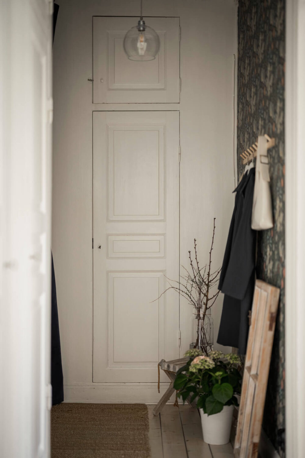 A Bright Swedish Apartment with Period Features and a Green Kitchen 25 built-in cabinet