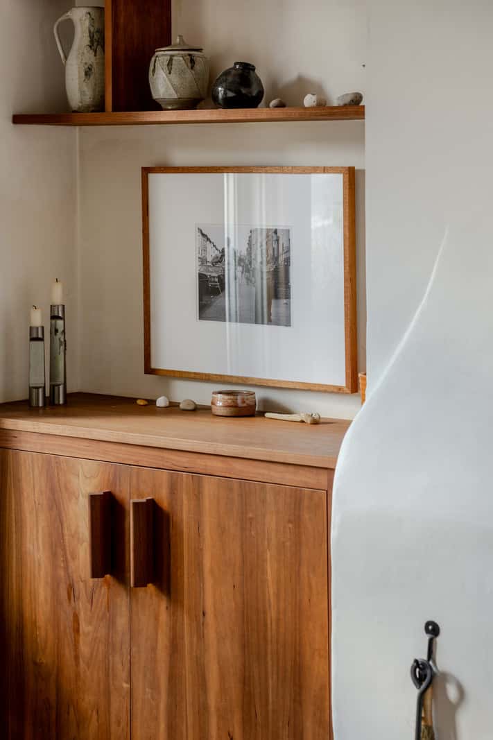 Reclaimed Materials and Custom Storage in a Serene London Home 5 built-in cabinet shelf