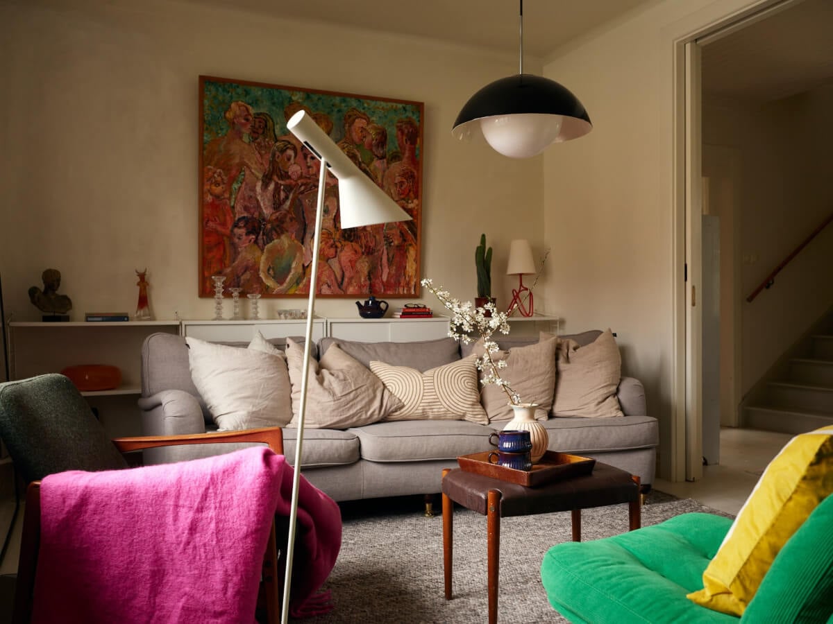 A Charming Semi-Detached House in the First Garden Town of Stockholm 4 cabinets behind sofa living room