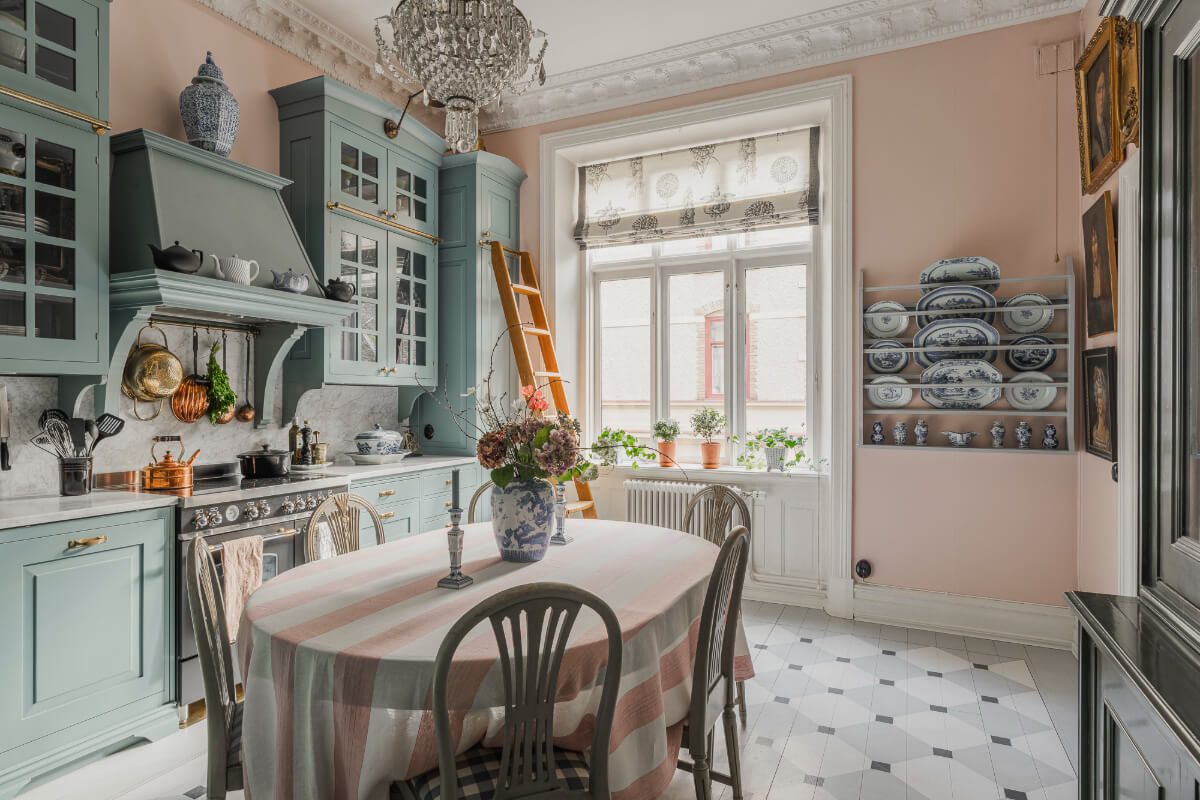A Colored Sixth Wall May Be The Biggest Paint Trend in 2026 15 classic kitchen pink walls large dining table A Colored Sixth Wall May Be The Biggest Paint Trend in 2026