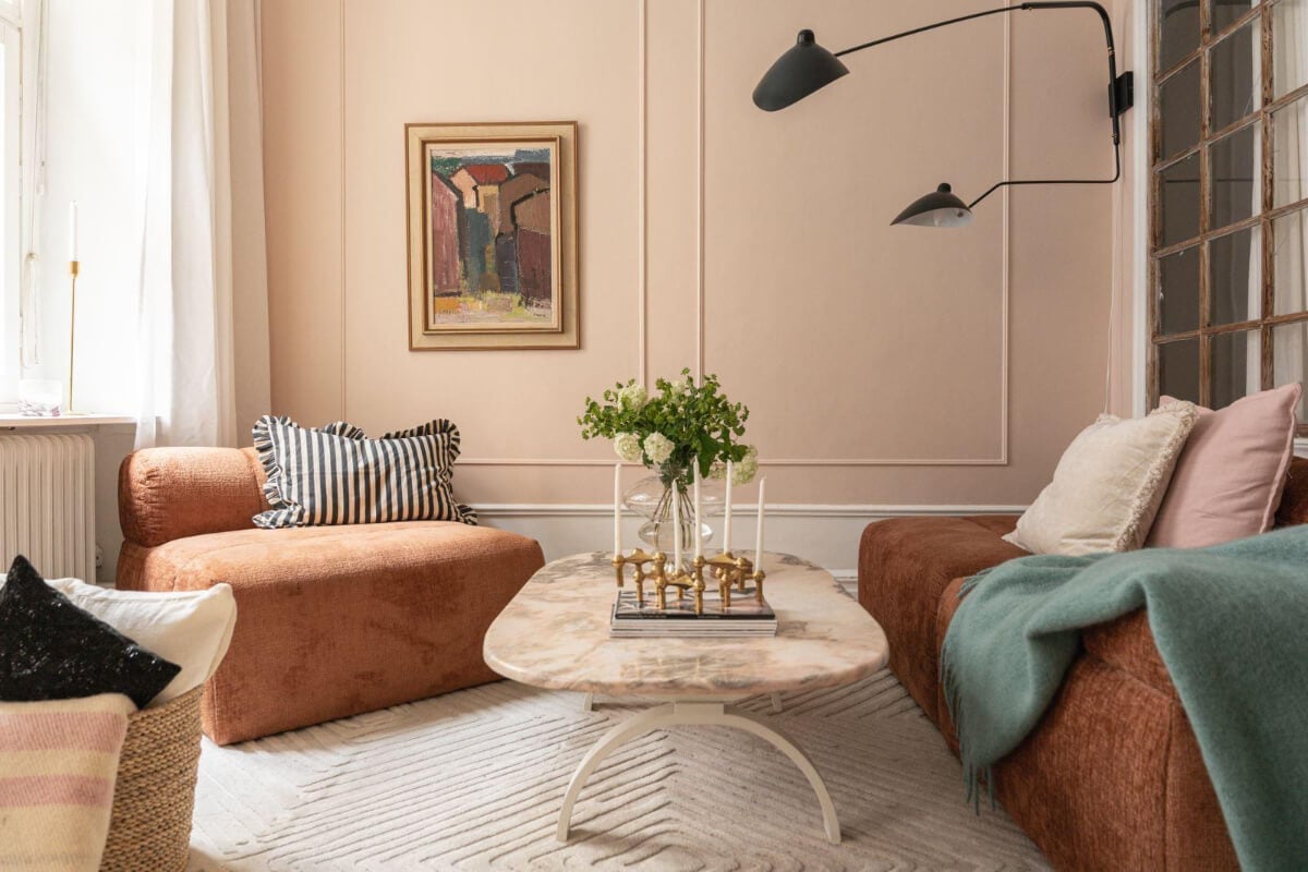 Warm Colors and Classic Elements in a Charming Studio Apartment 2 classic light pink living room