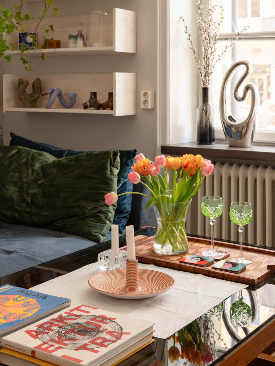 A Small, Cozy Apartment with Built-in Storage and Bookshelves 3 coffee table detail