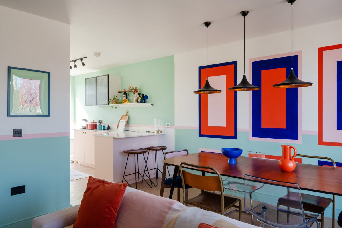 Arched Shapes and Hand-Painted Murals in a Joyful London Townhouse 11 colorful open plan living room kitchen
