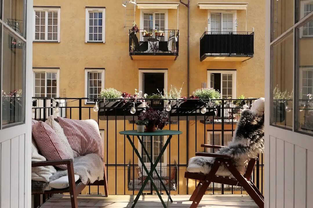 A Muted Palette and a Cozy Kitchen Breakfast Nook in a Swedish Apartment 17 courtyard balcony