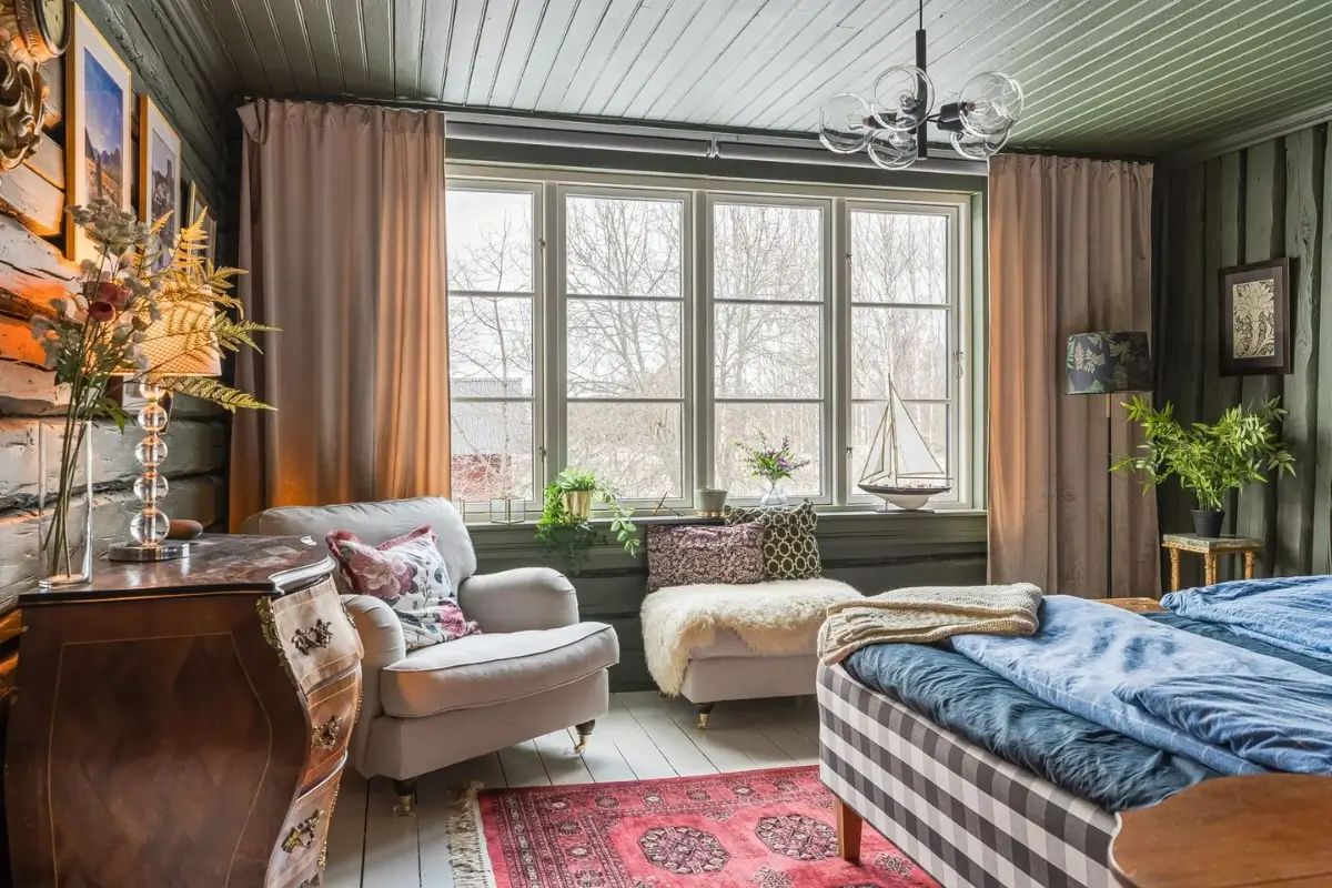 A Cozy Country House in Sweden Filled with Wallpapers 21 cozy rustic green bedroom with seating