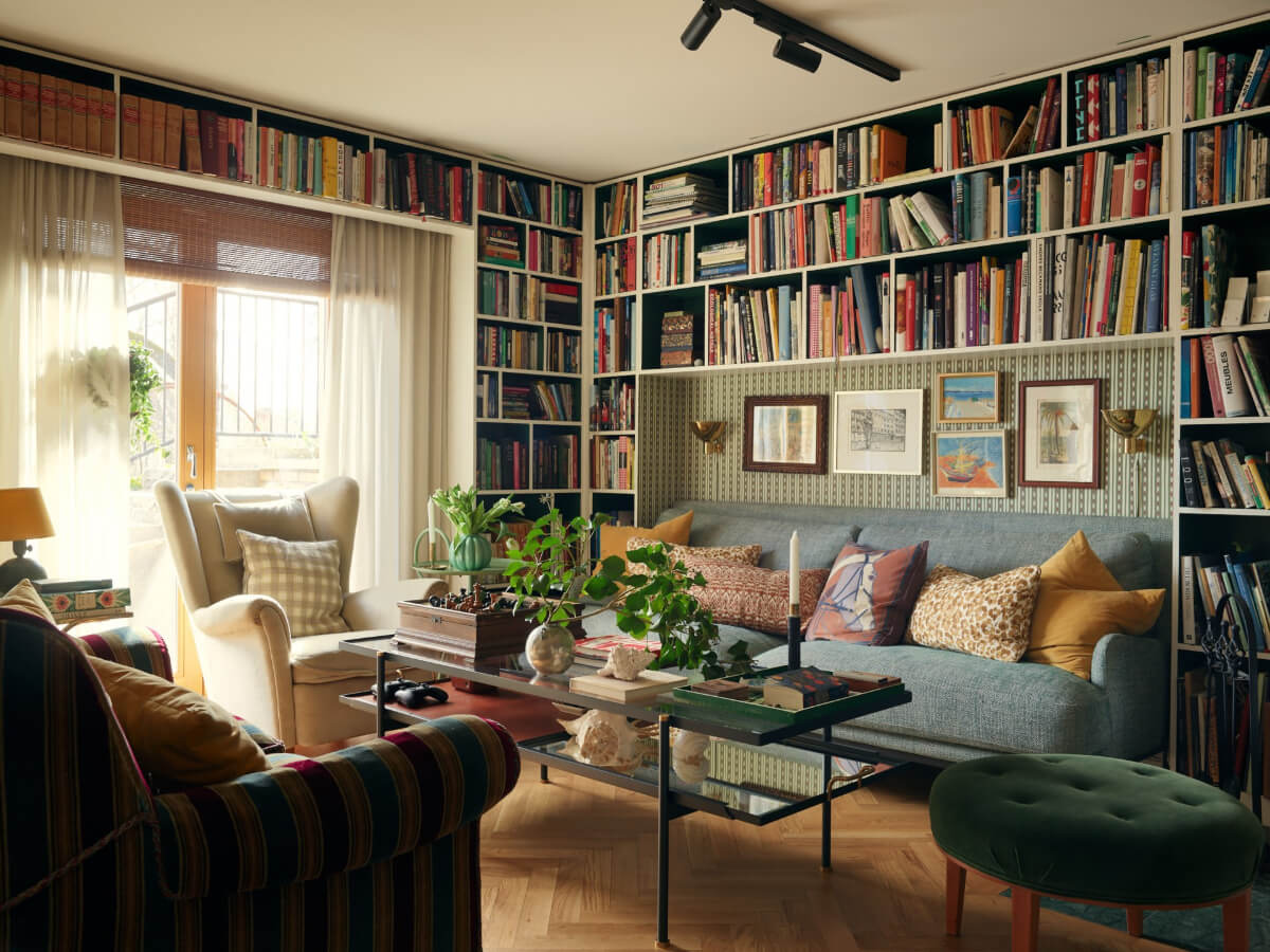 A Personal and Cozy 1960s Family Home in Sweden 27 cozy sitting room wallpaper bookshelves
