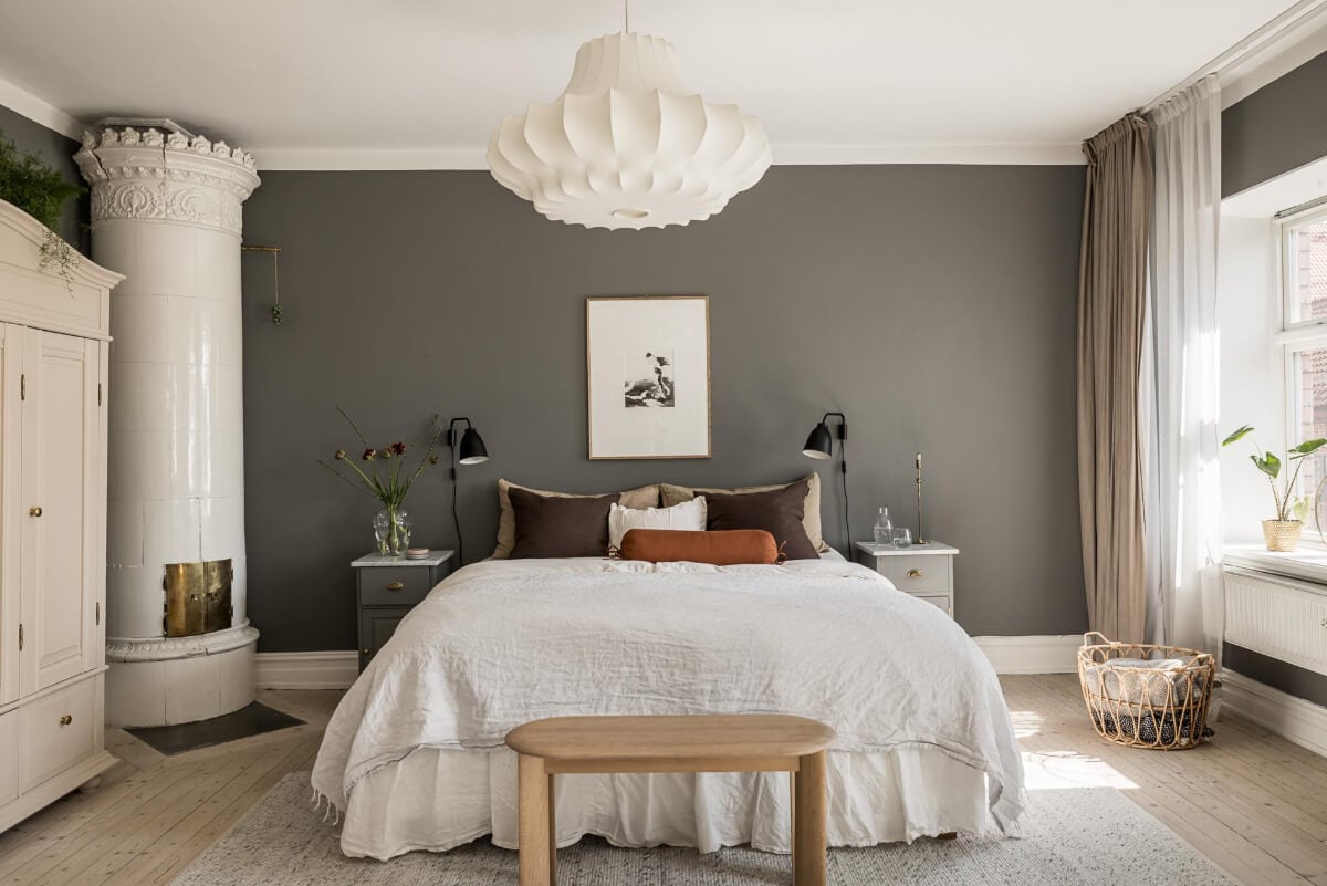 Gray Tones and a Classic Kitchen in a Swedish Apartment 10 dark gray bedroom fireplace