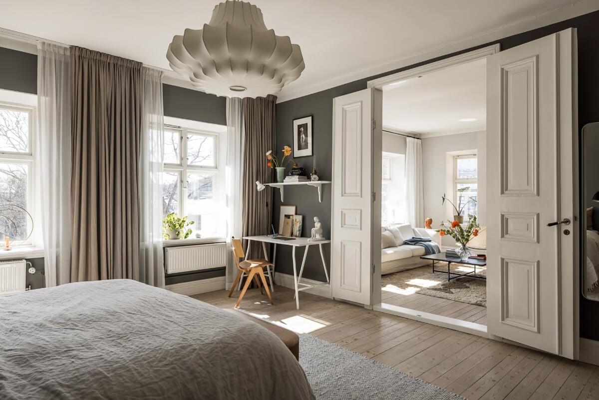 Gray Tones and a Classic Kitchen in a Swedish Apartment 11 dark gray bedroom with white desk