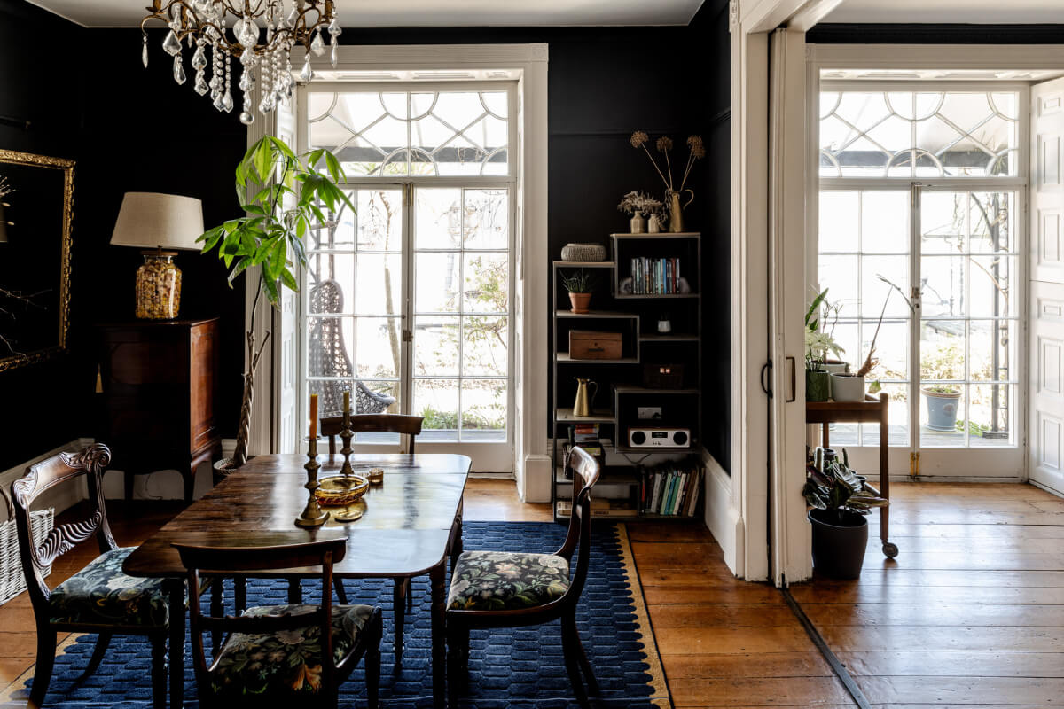 dark painted dining room huge window