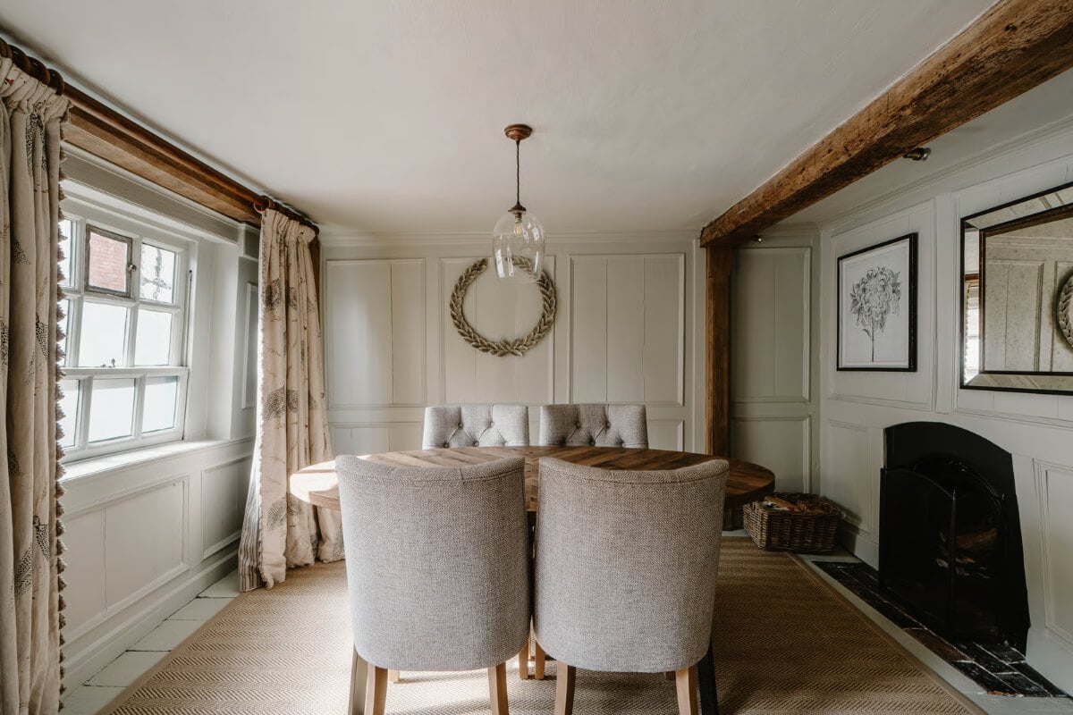 Serene Colors and Historic Elements in an Elizabethan Home in Wiltshire 2 dining room fireplace wooden beam