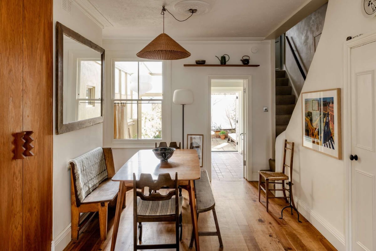 Reclaimed Materials and Custom Storage in a Serene London Home 7 dining room vintage table