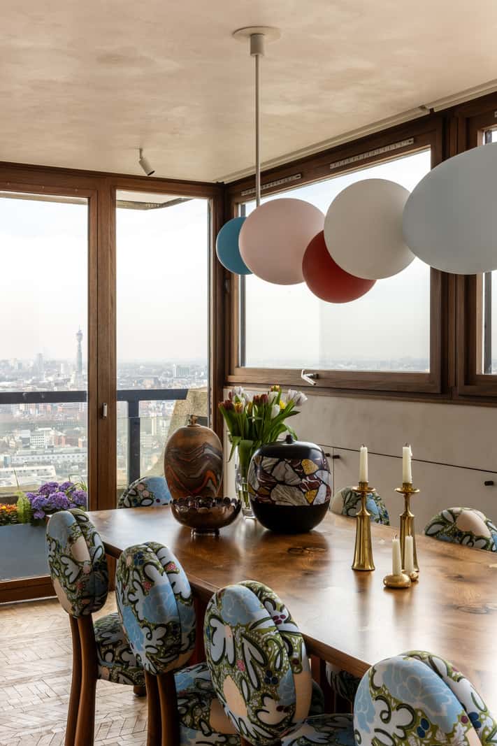 Oak and Marble in a Spectacular Brutalist Apartment in London 12 dining table