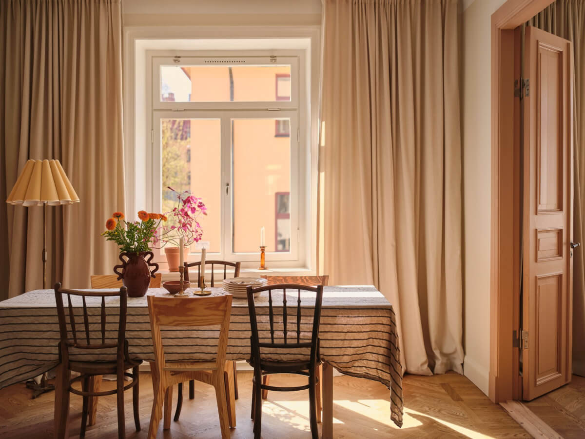 Warm, Natural Light in a Renovated Turn-of-the-Century Apartment 2 dining table