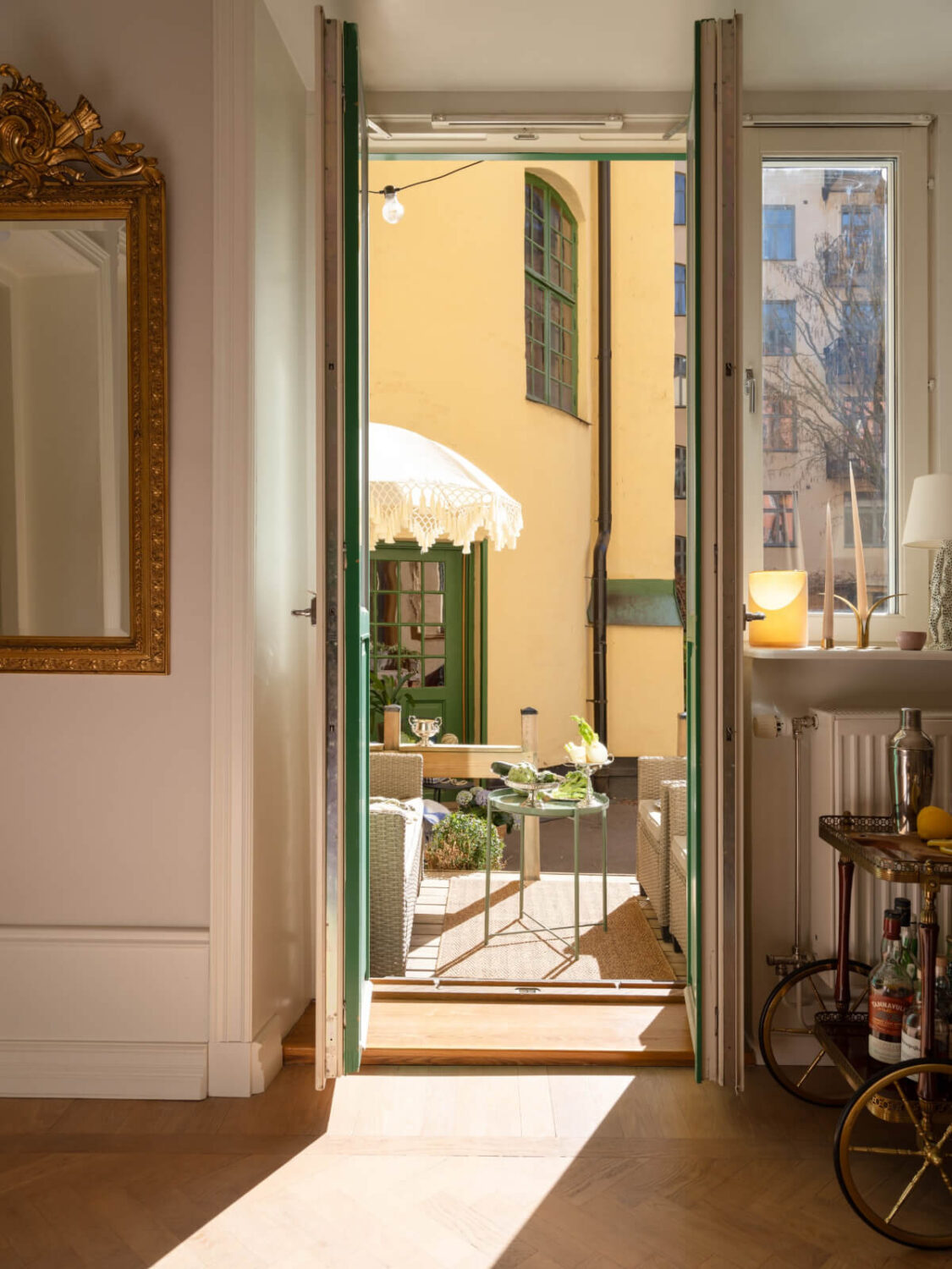A Small Apartment with Green Color Accents and a Cozy Patio Terrace 7 doors to terrace