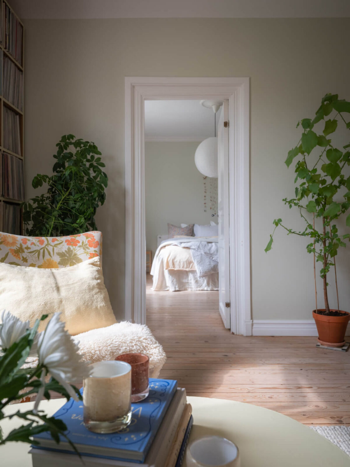 A Soft Color Palette and a Charming Kitchen in a Swedish Apartment 20 doorway to bedroom