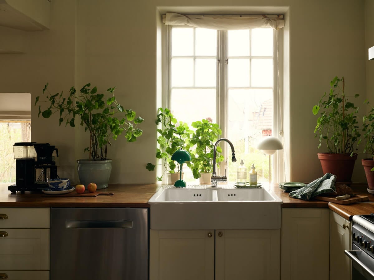 A Charming Semi-Detached House in the First Garden Town of Stockholm 12 double butler sink under large window