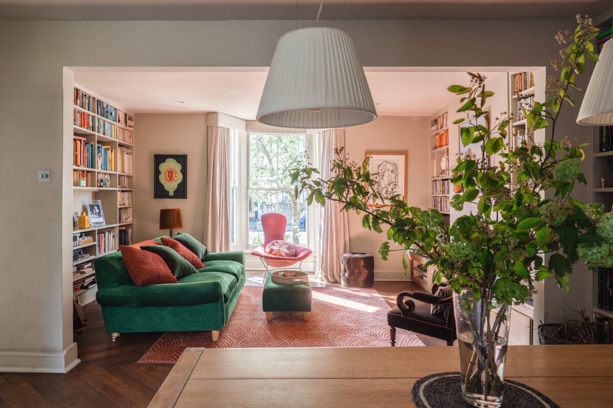 An Edwardian House with Muted Tones, Natural Materials, and a Landscaped Garden 5 double living room bookshelves bay window