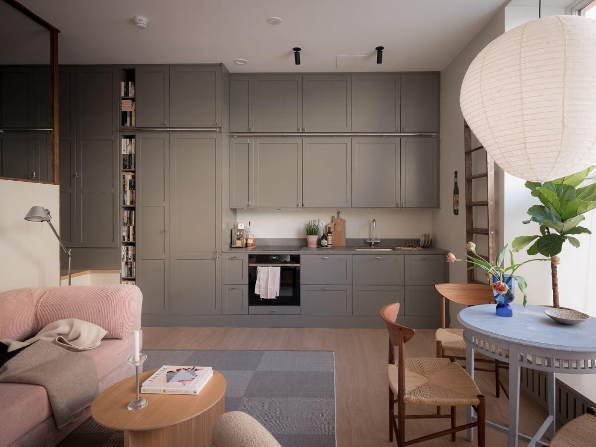 A Modern Split-Level Apartment in a Former Bakery 2 double row upper cabinets open-plan living space