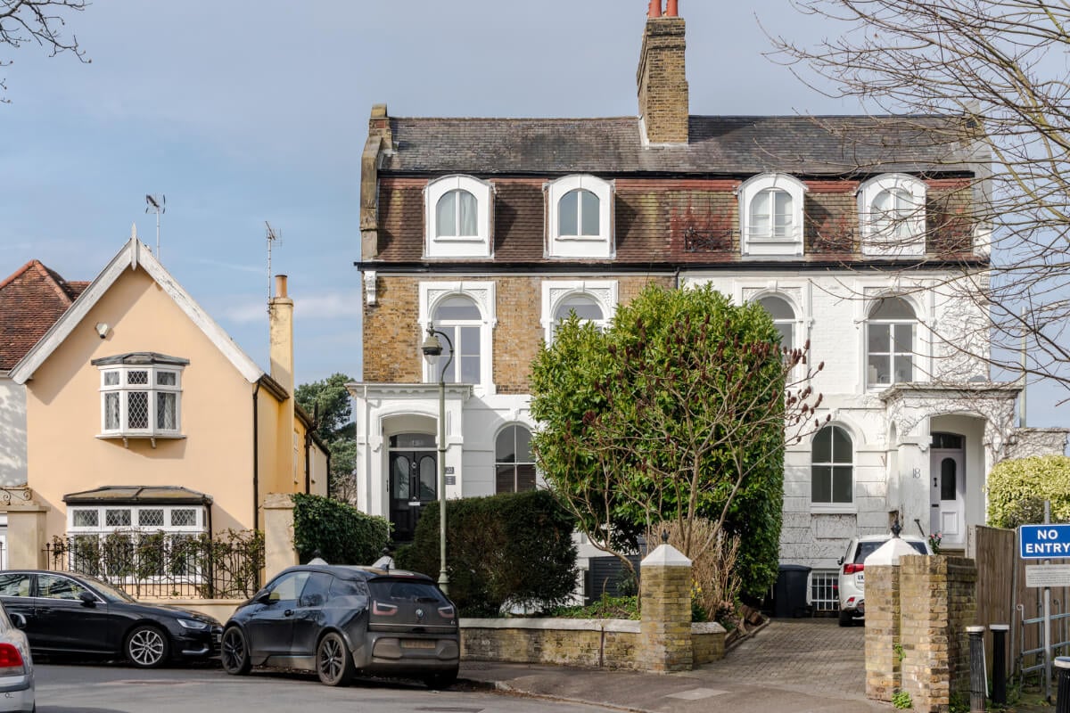 A Serene Color Palette and Arched Windows in a Small English Apartment 16 exterior english apartment