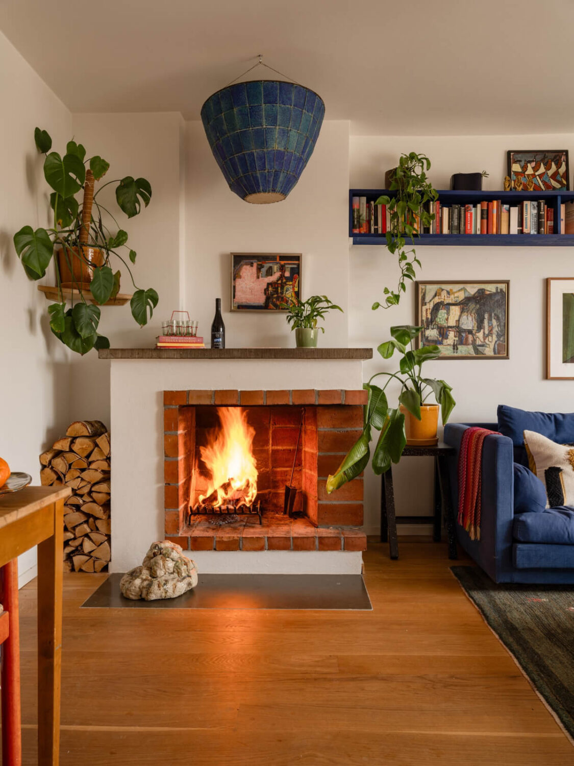 Color Accents in a Renovated Midcentury Apartment in Stockholm 5 fireplace