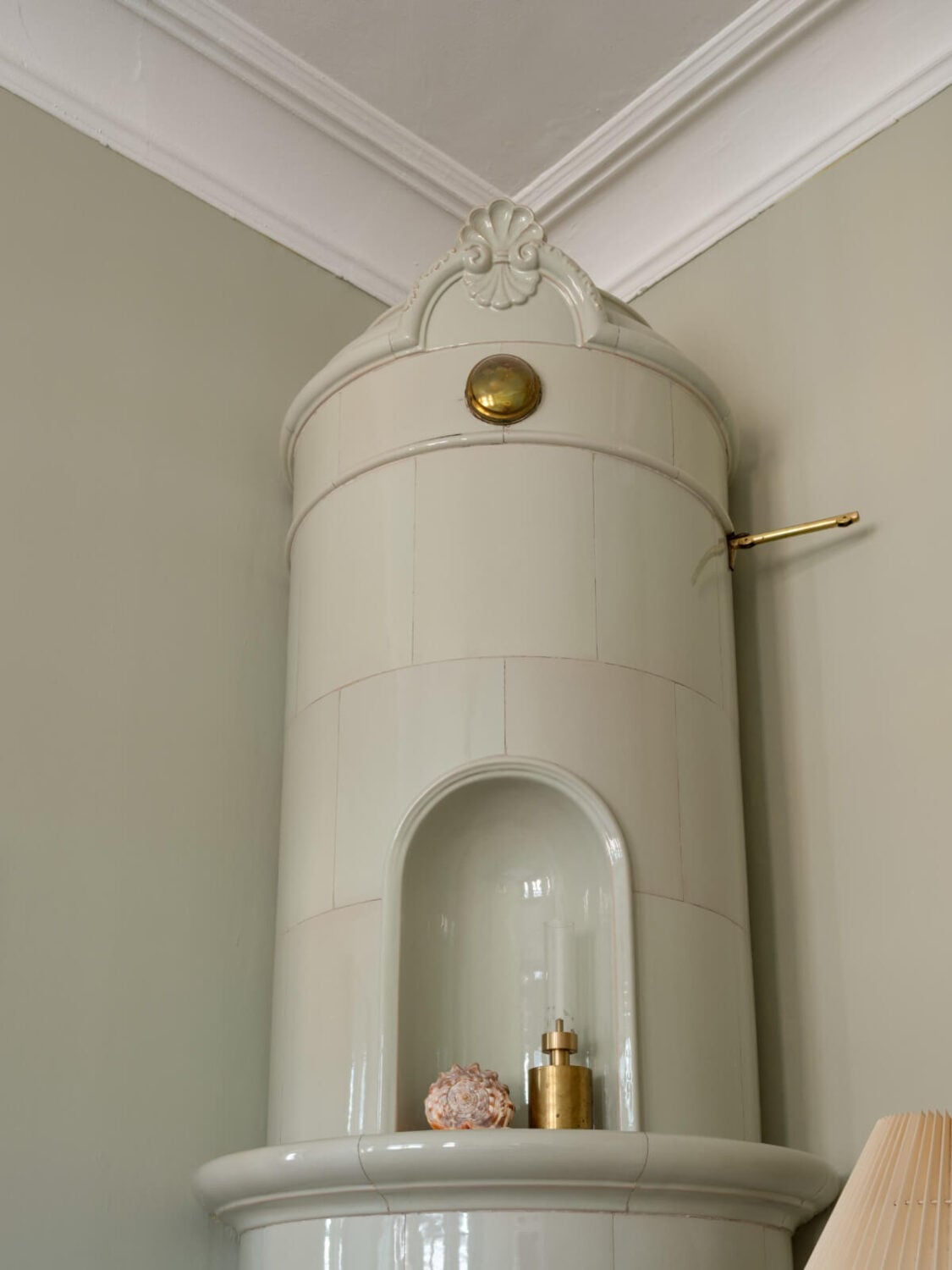 Turn-of-the-Century Charm and Site-Built Storage in a Stockholm Apartment 21 fireplace detail