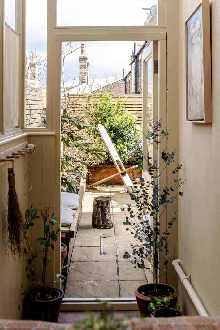 Reclaimed Materials and Custom Storage in a Serene London Home 23 garden acces
