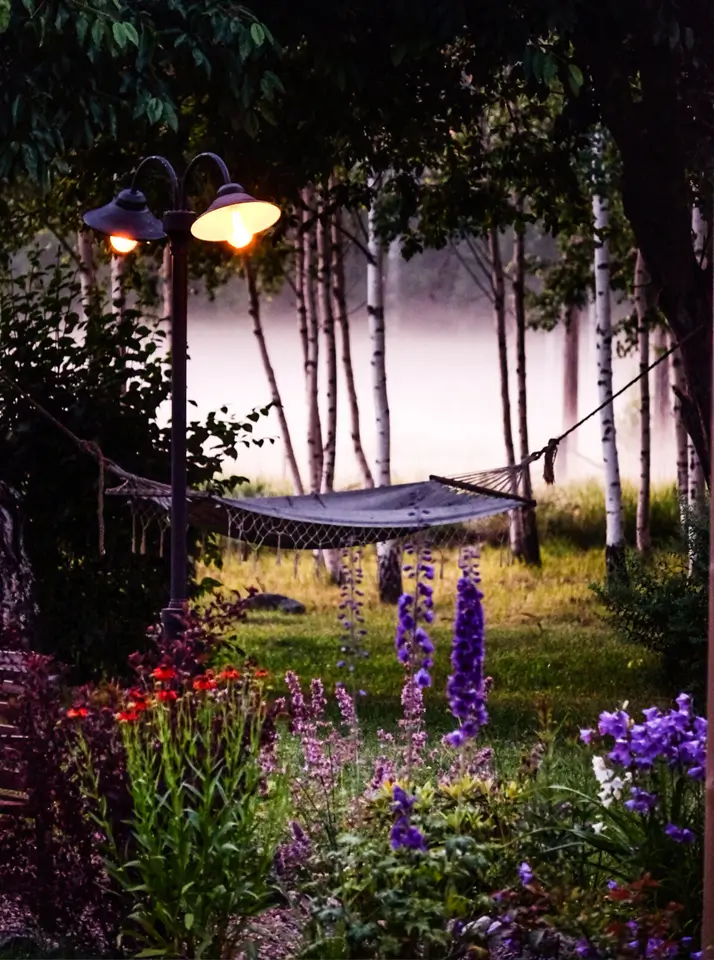 A Cozy Country House in Sweden Filled with Wallpapers 39 garden hammock