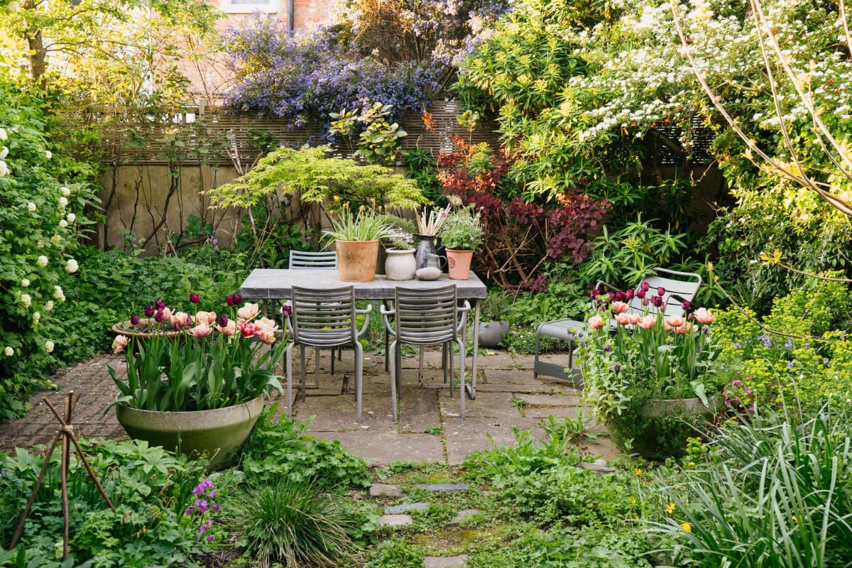 An Edwardian House with Muted Tones, Natural Materials, and a Landscaped Garden 15 garden-table