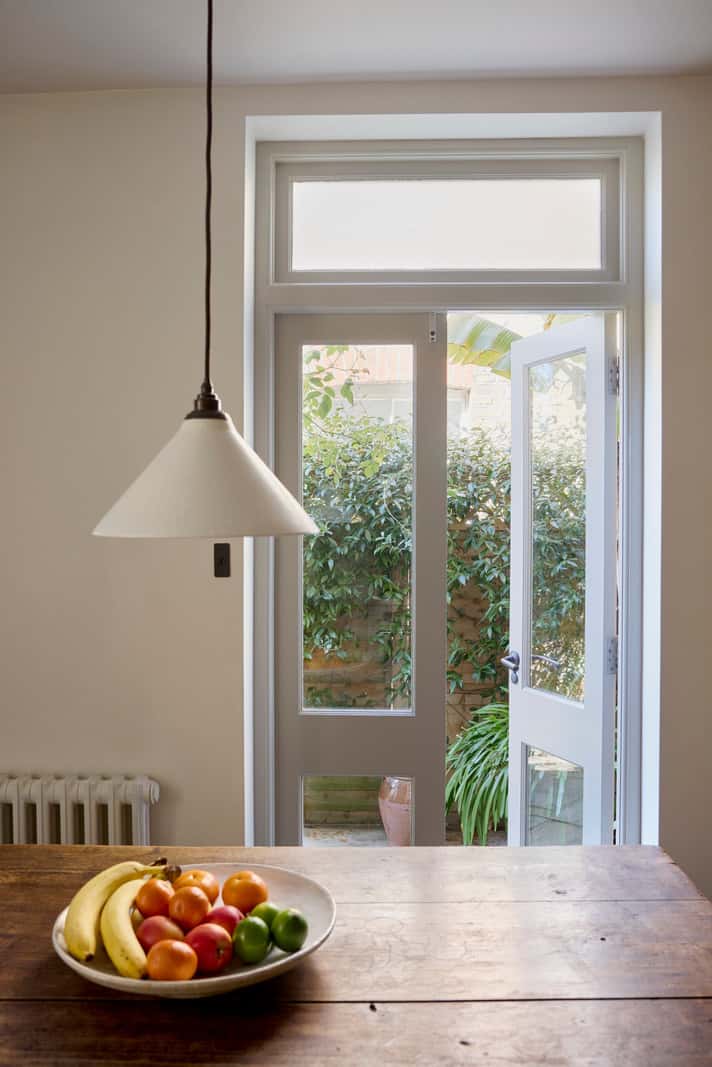 Bespoke Oak Cabinets and Plaster Walls in a London Garden Apartment 13 glass garden doors