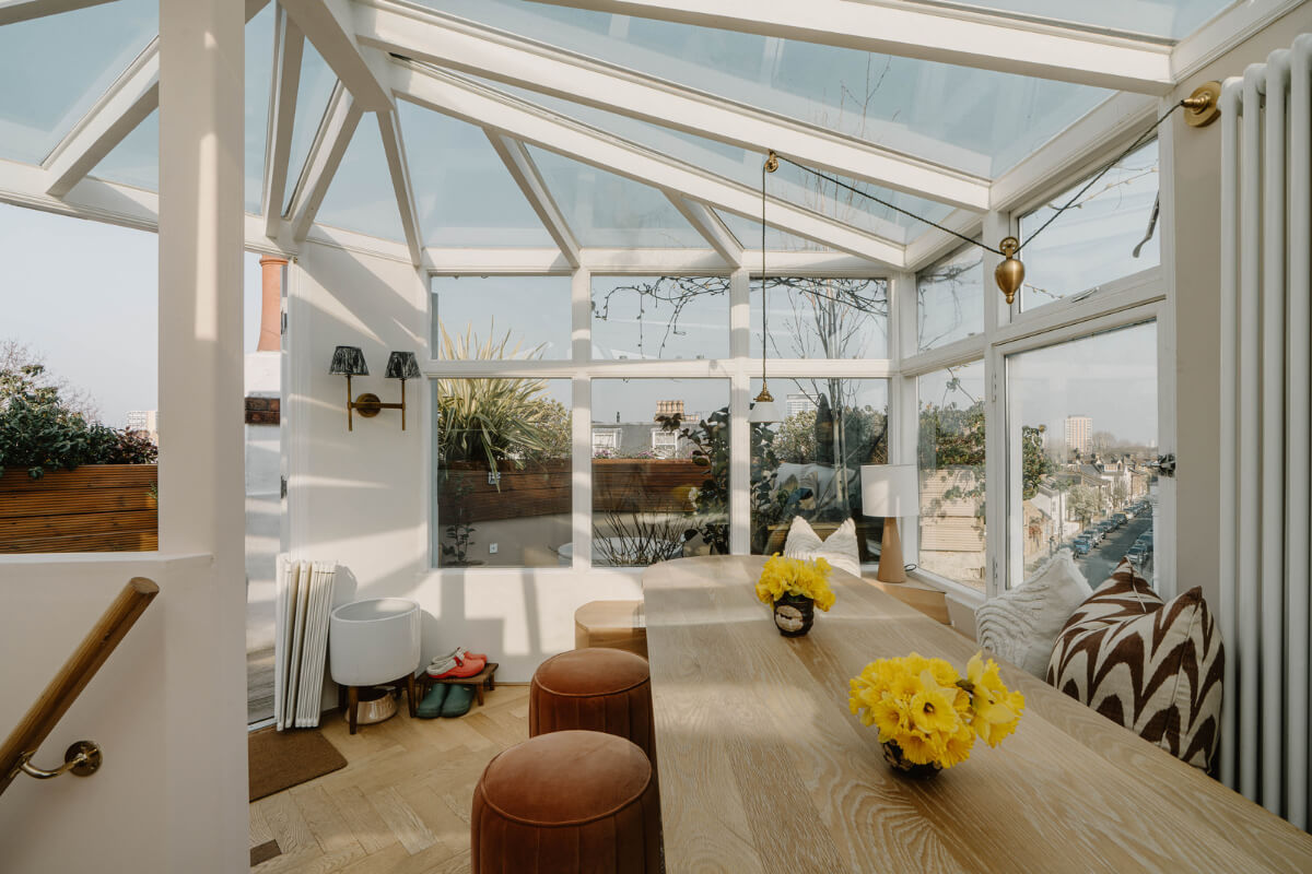 A Classy Apartment on the Top Floors of a 19th-Century Building 15 glass rooftop room