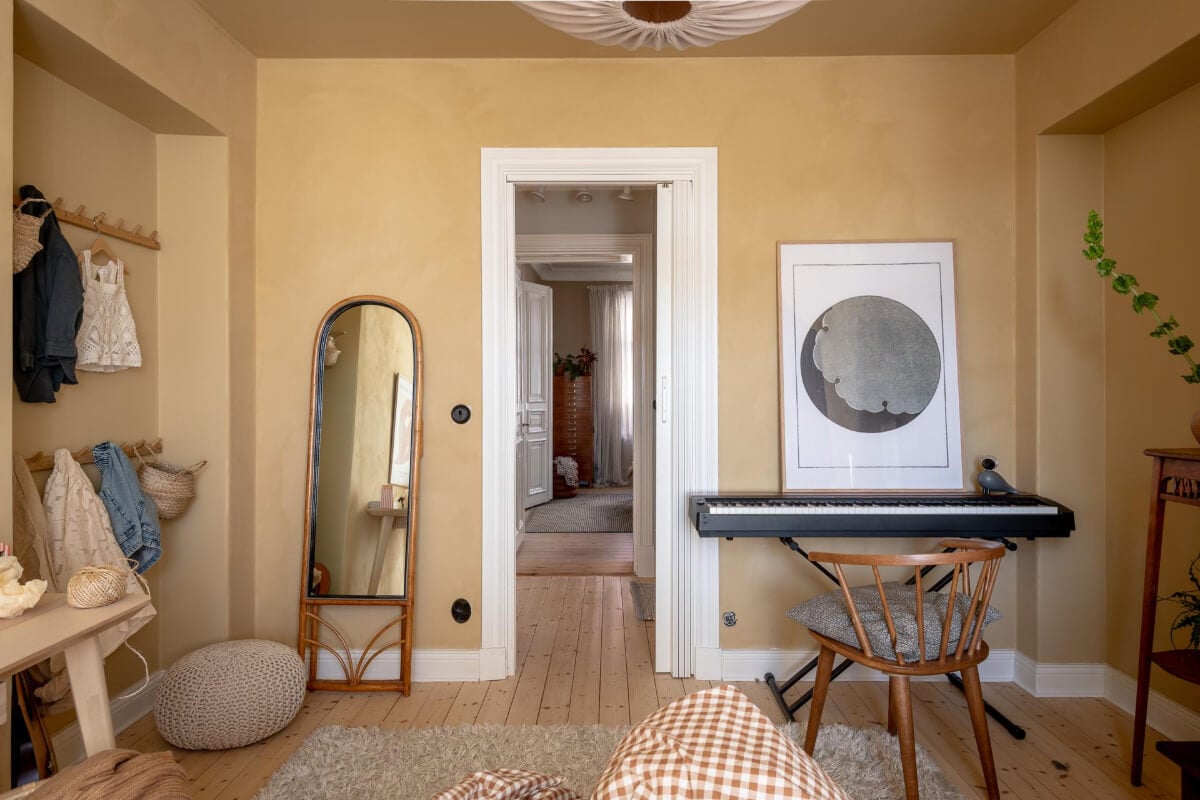 A Natural Color Palette, Period Features, & Grand Rooms in a Swedish Home 36 gold walls kids bedroom