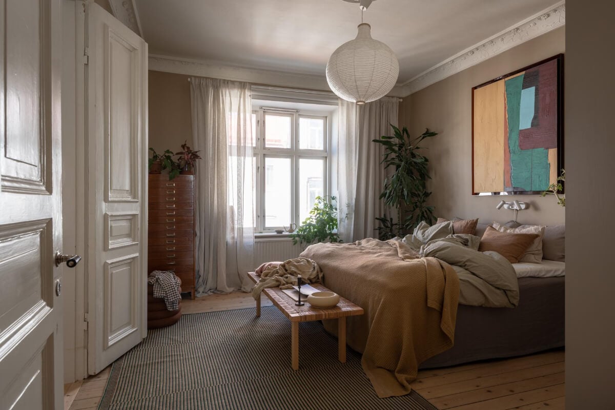 A Natural Color Palette, Period Features, & Grand Rooms in a Swedish Home 13 gray bedroom white stucco