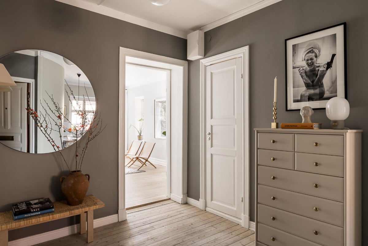 Gray Tones and a Classic Kitchen in a Swedish Apartment 27 gray hall large round mirror