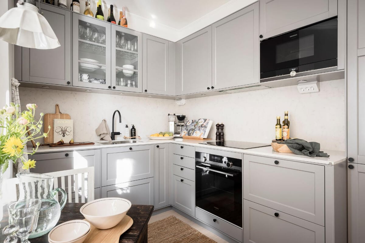 A Bright One-Bedroom Apartment with a Large Balcony 13 gray kitchen black fittings