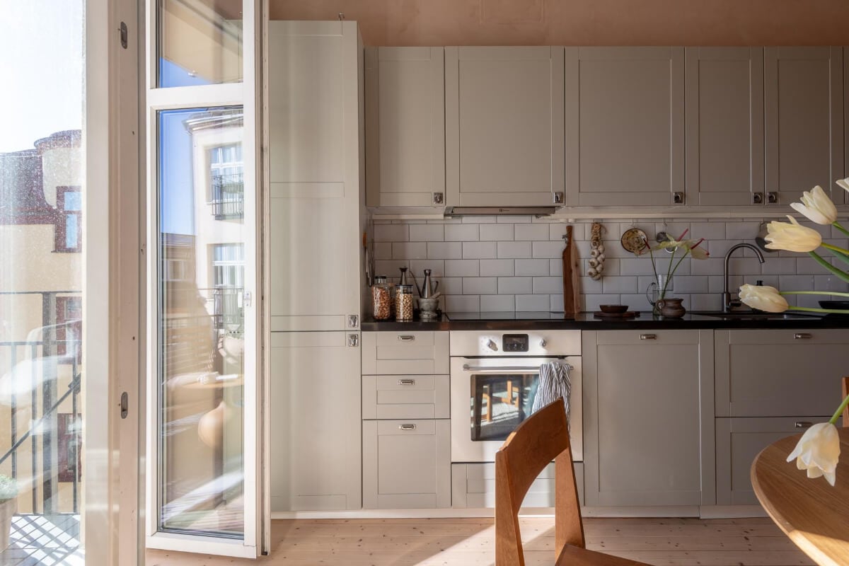 A Natural Color Palette, Period Features, & Grand Rooms in a Swedish Home 24 gray kitchen white subway tiles
