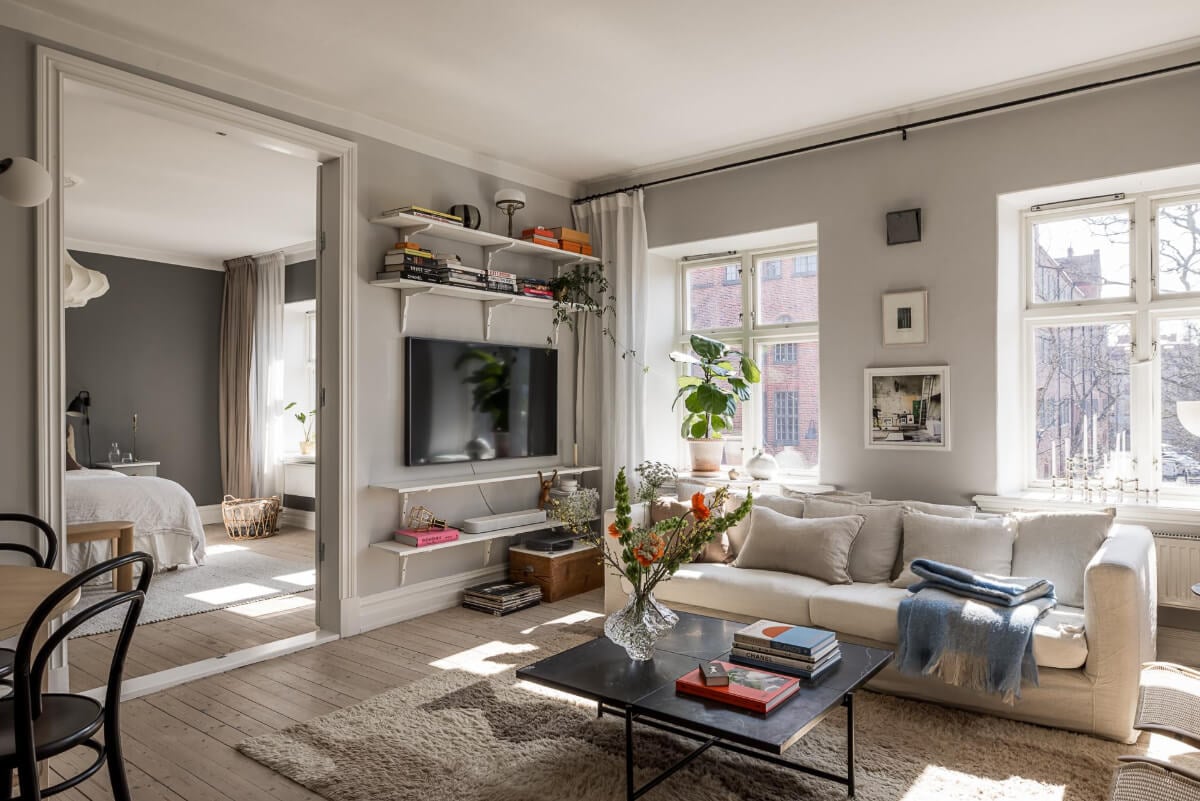 Gray Tones and a Classic Kitchen in a Swedish Apartment 2 gray living room large windows