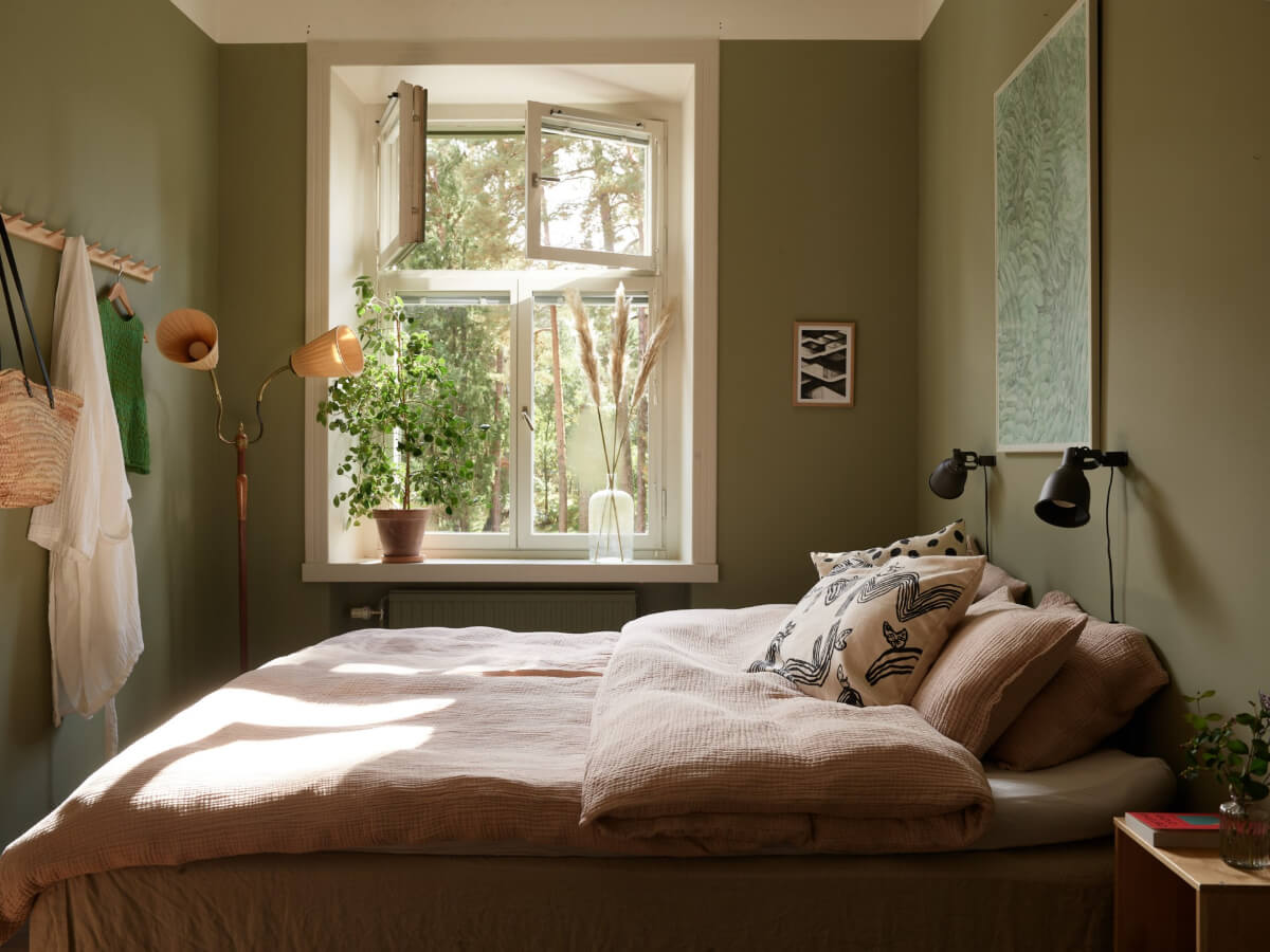A Nature-Inspired Color Palette in a Stockholm Apartment 14 green bedroom large windows