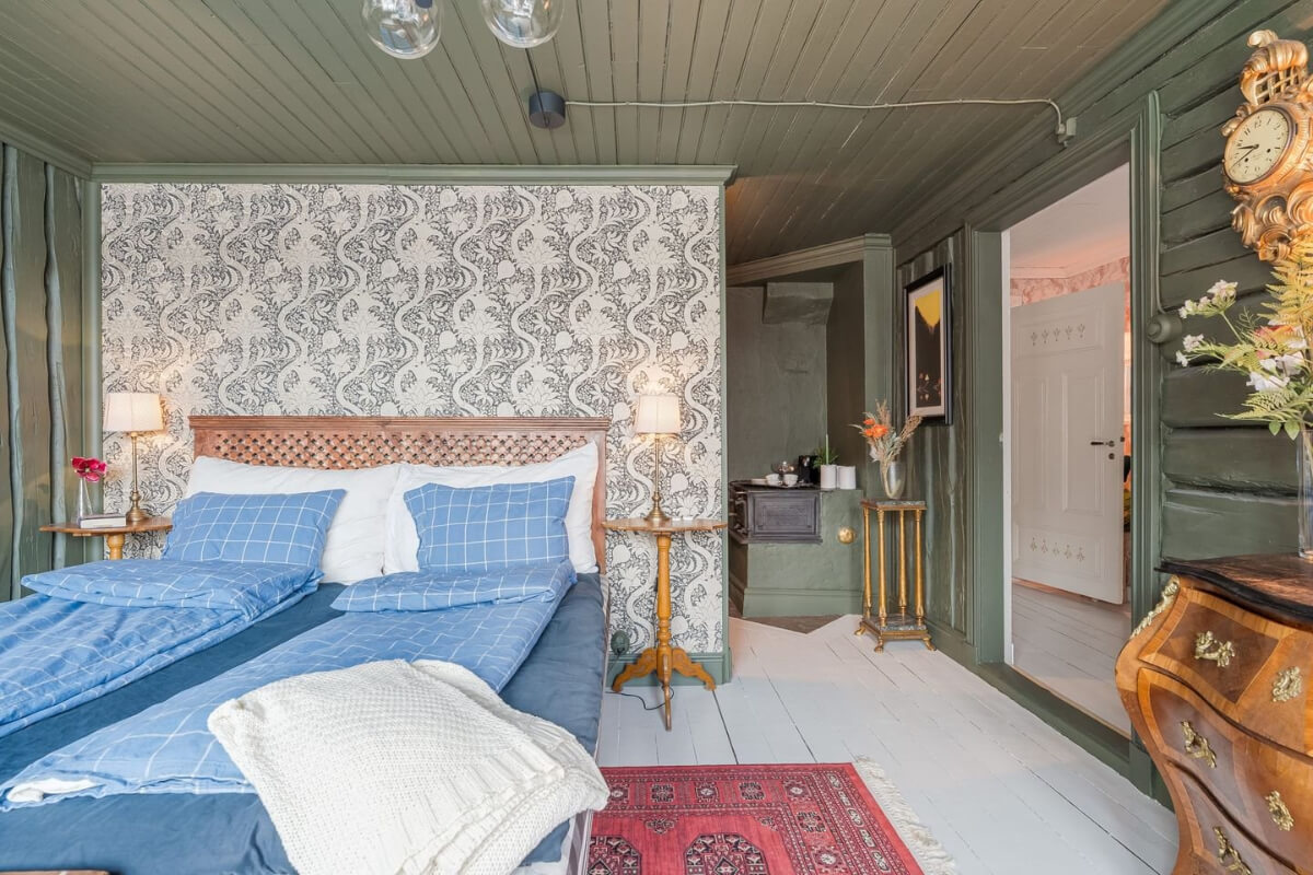 A Cozy Country House in Sweden Filled with Wallpapers 22 green bedroom wallpaper feature wall