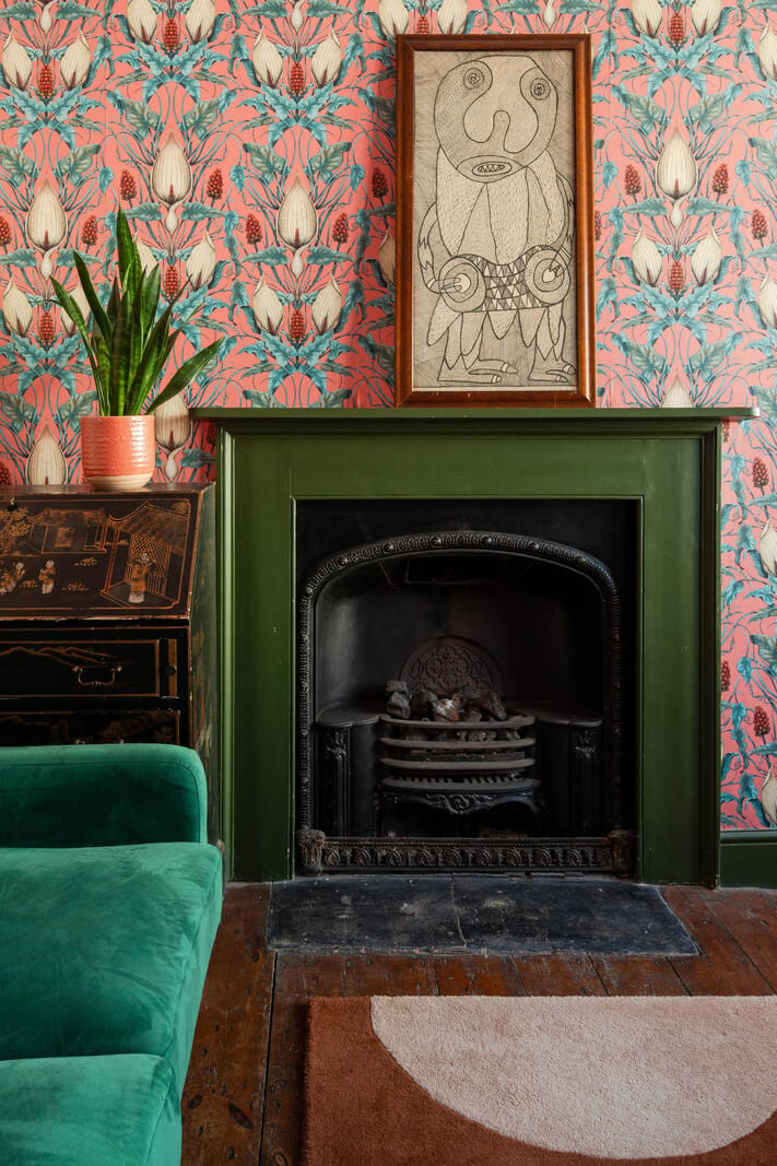 Colorful Design and Historic Features in a Charming English Home 9 green fireplace detail nordroom