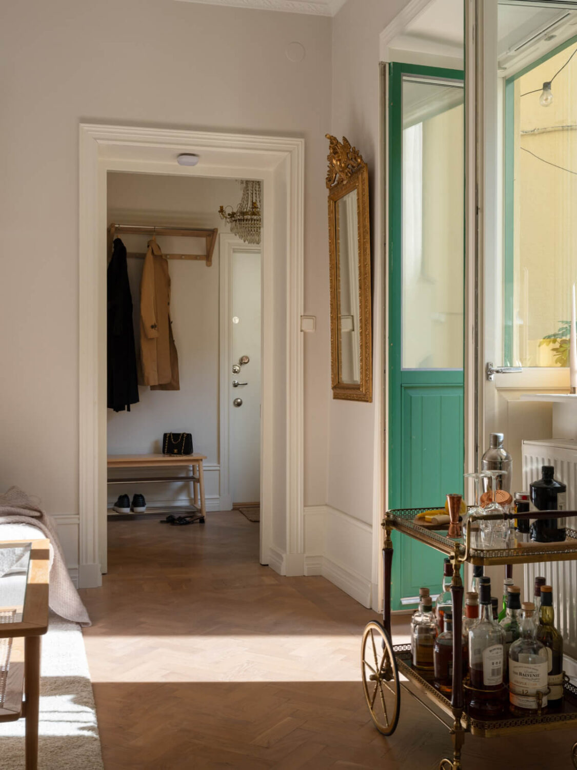 A Small Apartment with Green Color Accents and a Cozy Patio Terrace 6 green terrace doors
