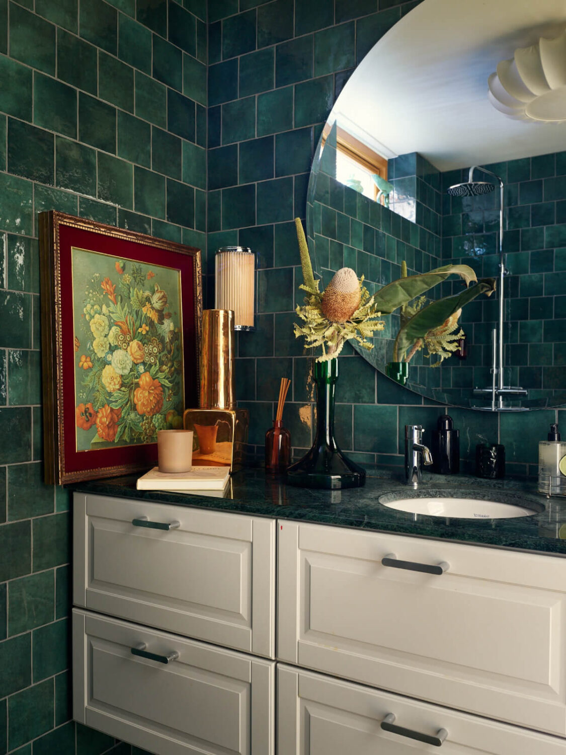 A Personal and Cozy 1960s Family Home in Sweden 34 green tiled bathroom marble