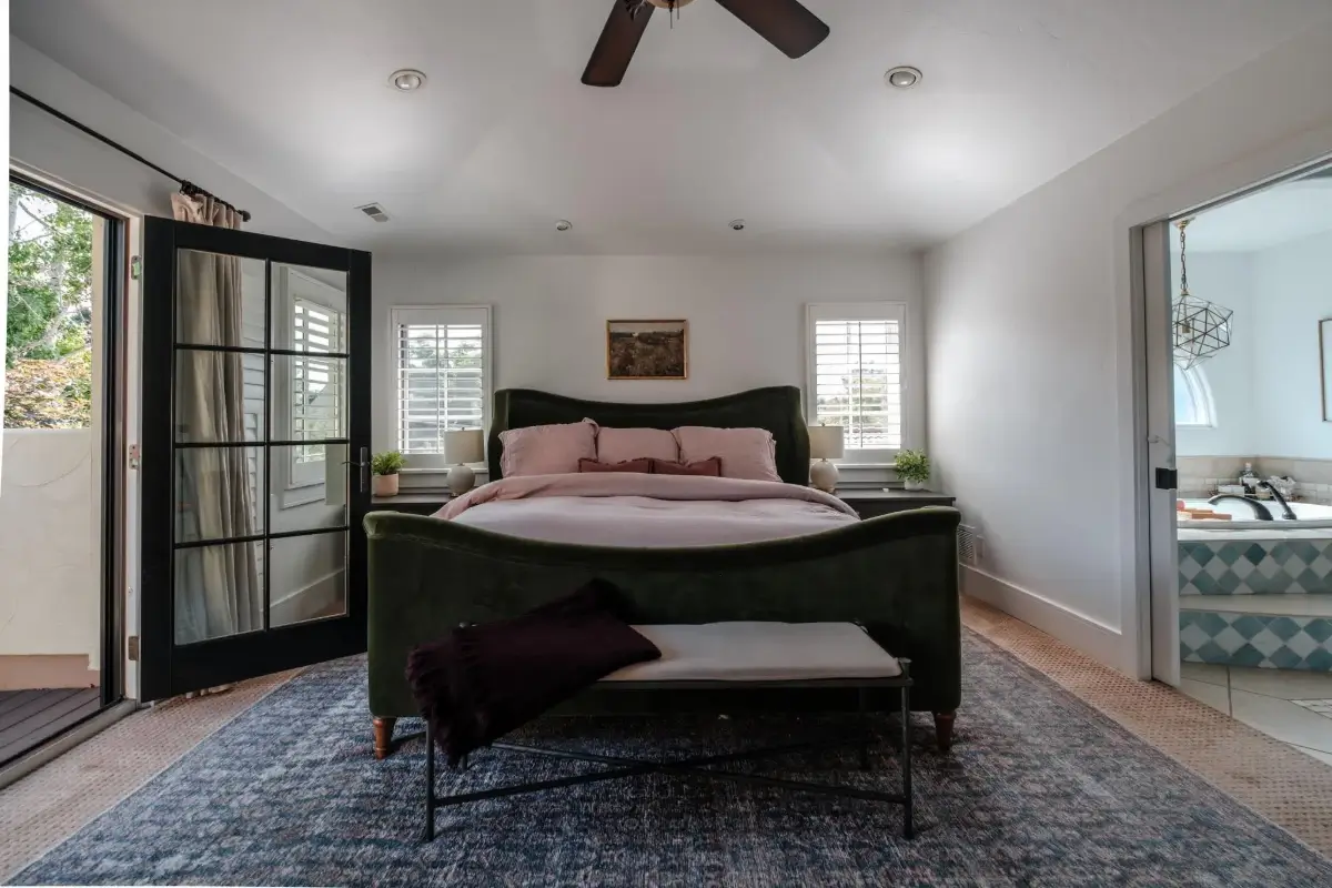 Mediterranean Elegance Meets Modern Living in the Heart of Bonnie Brae 28 green velvet bed bedroom