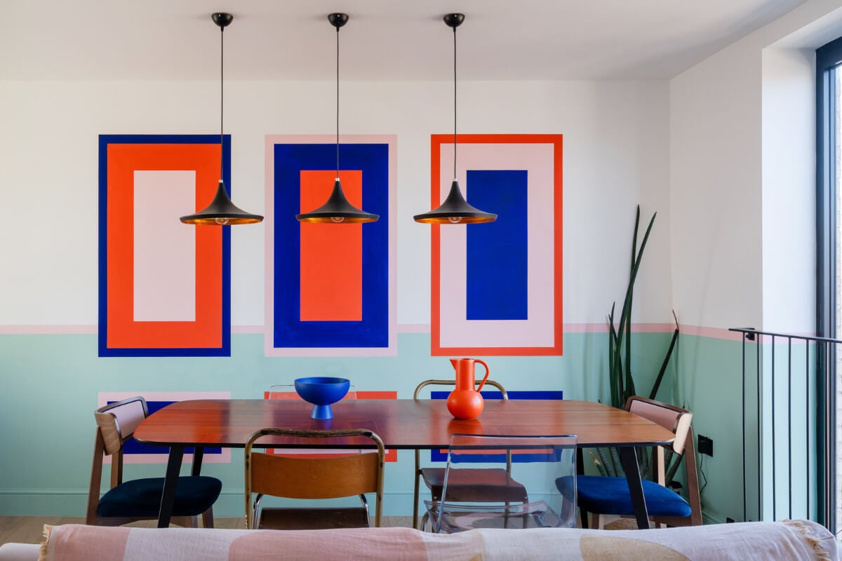 Arched Shapes and Hand-Painted Murals in a Joyful London Townhouse 10 half painted wall vibrant colors living room