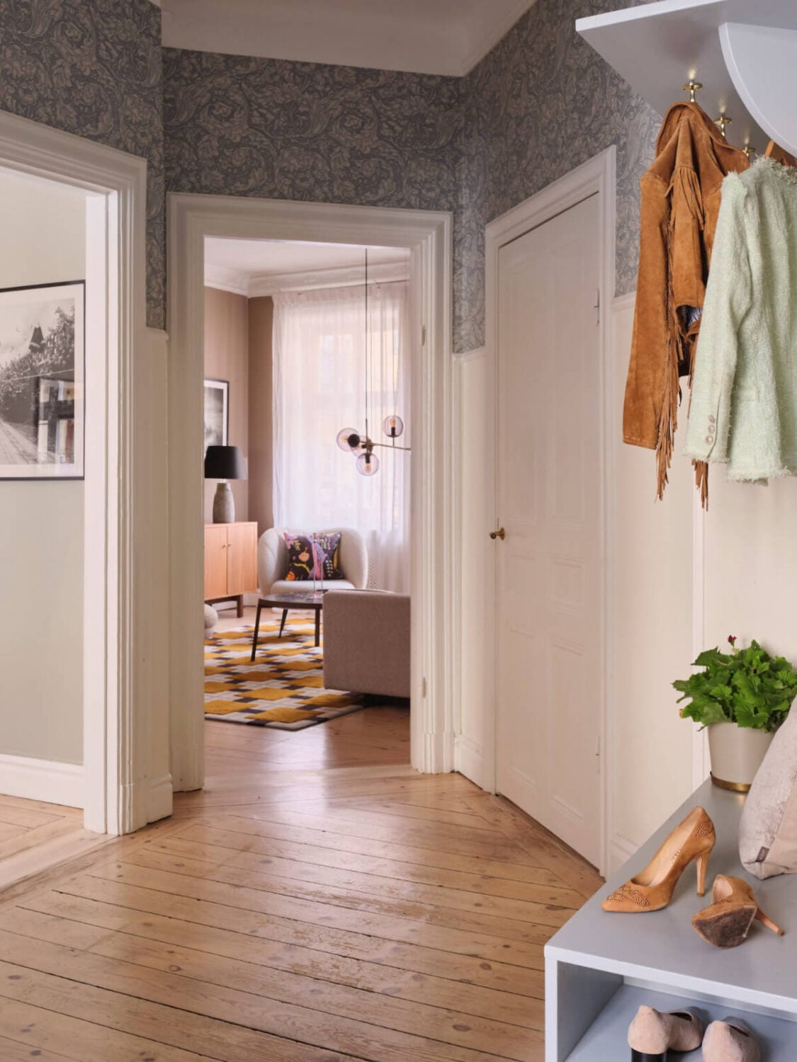 A Spacious Turn-of-the-Century Apartment with Nice Color Accents 29 hall blue wallpaper