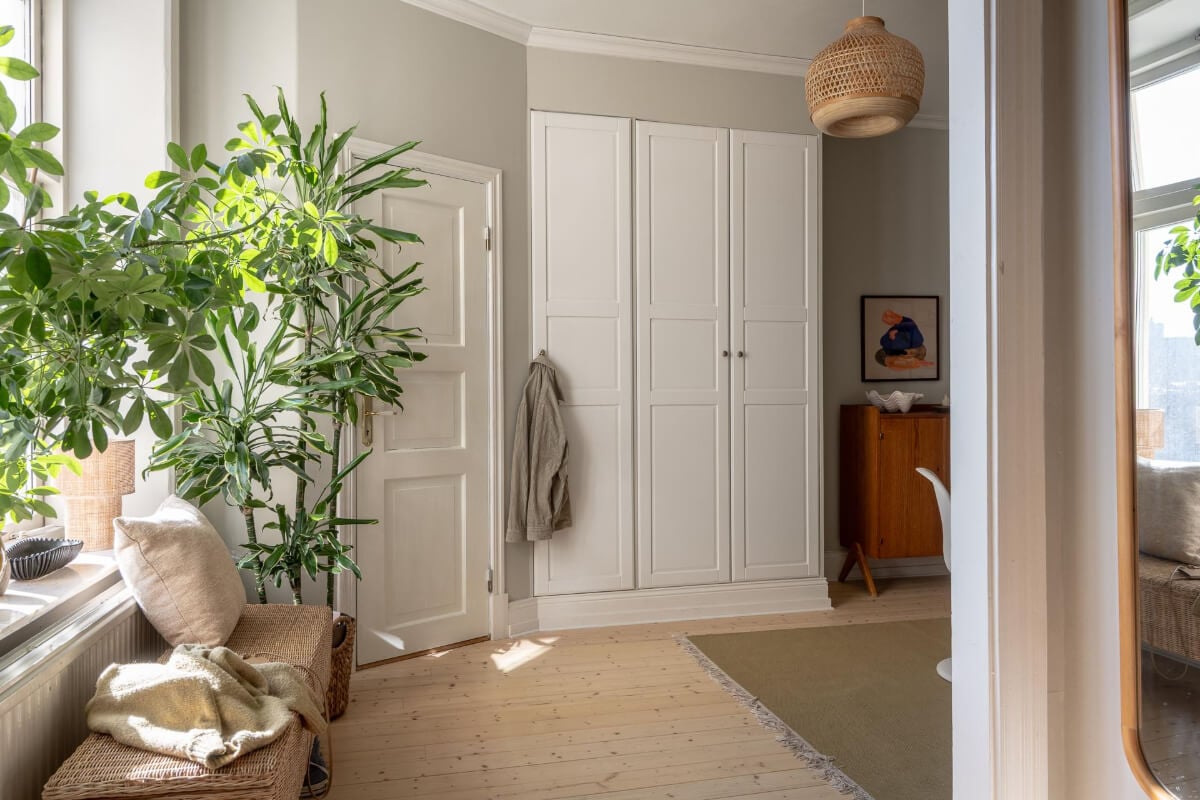 A Natural Color Palette, Period Features, & Grand Rooms in a Swedish Home 42 hall-built-in-closets
