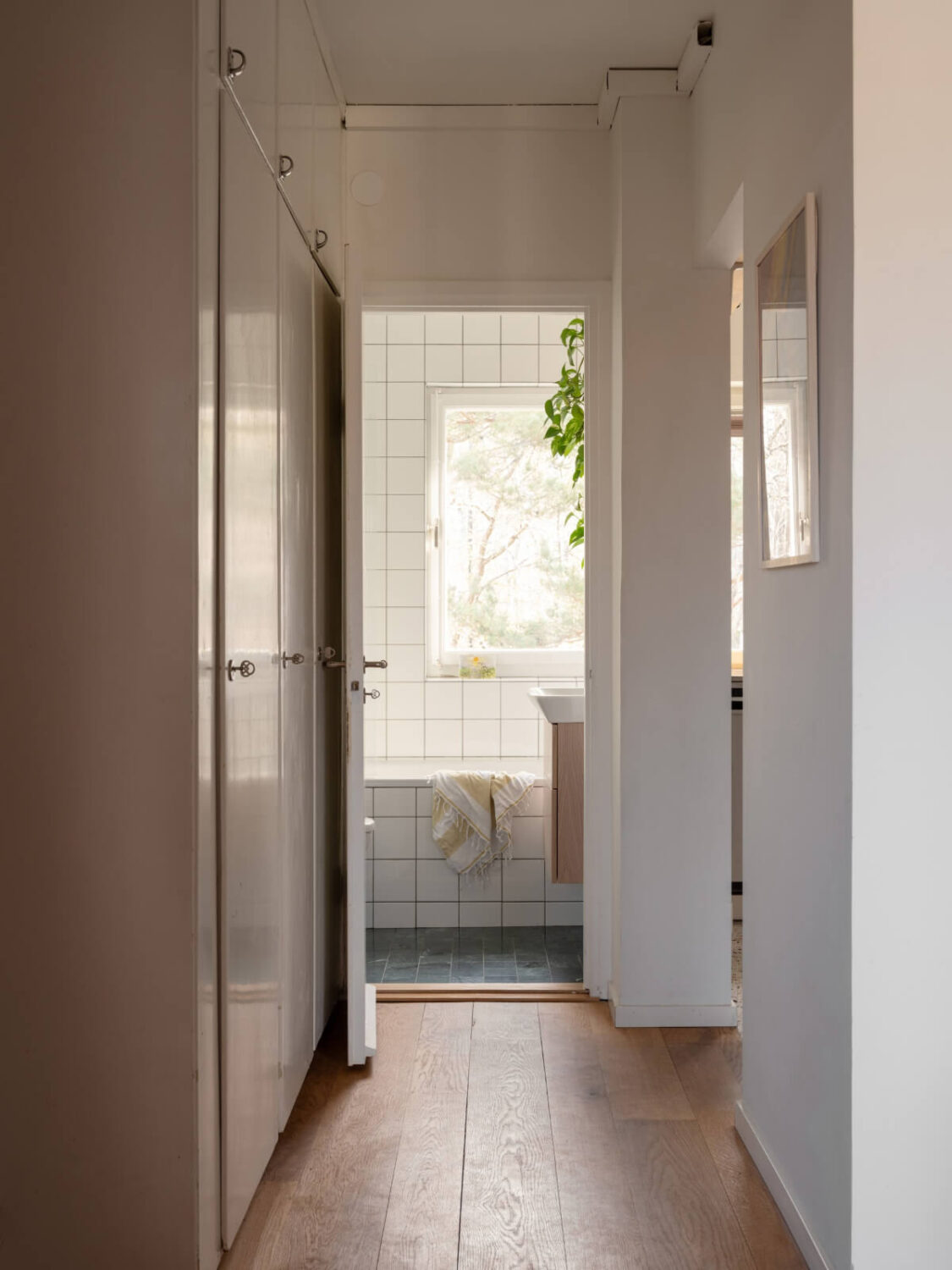 Color Accents in a Renovated Midcentury Apartment in Stockholm 20 hall built-in wardrobes