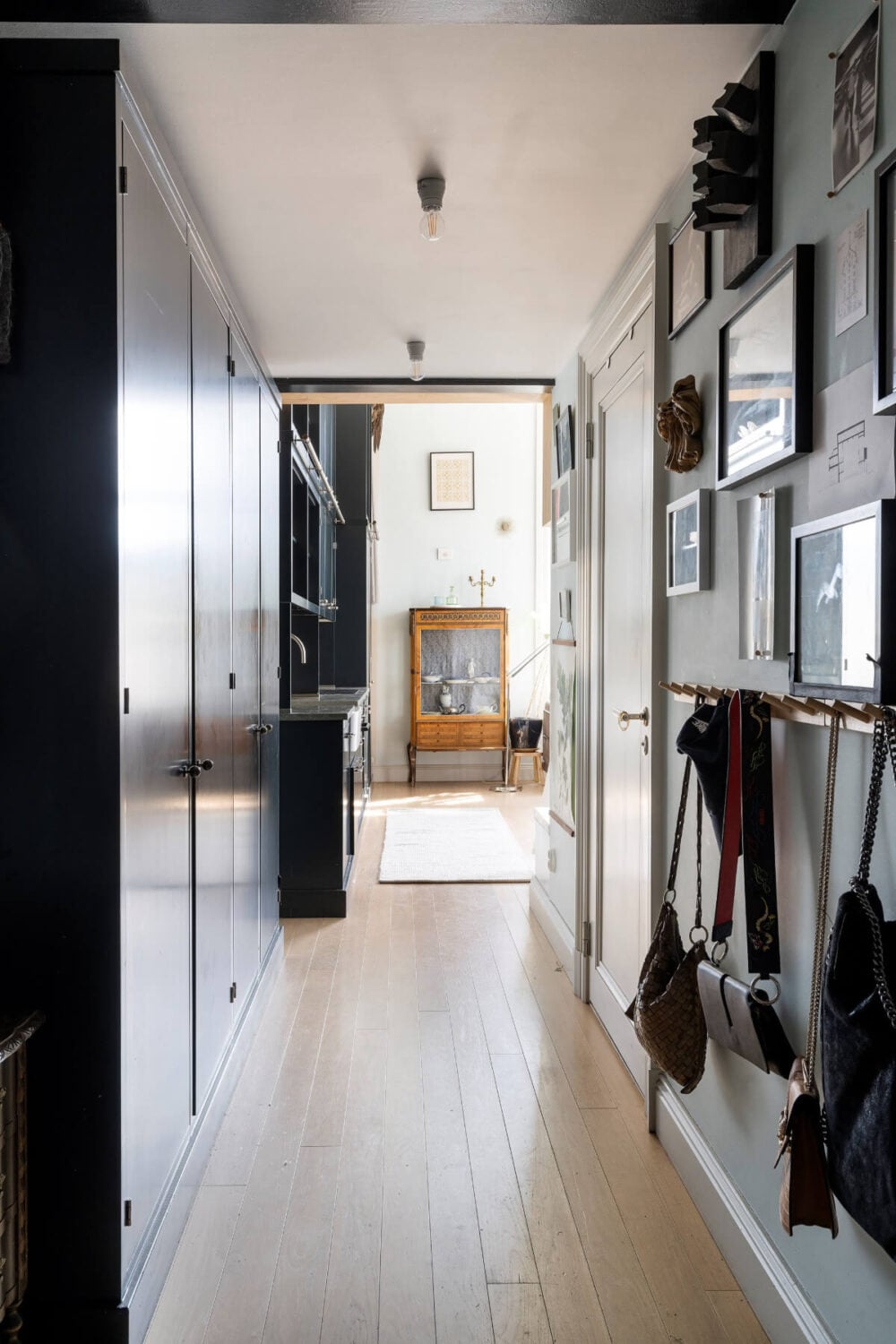 Pale Blue Walls and Huge Windows in a Swedish Loft Apartment 27 hall built in wardrobes 3 Pale Blue Walls and Huge Windows in a Swedish Loft Apartment