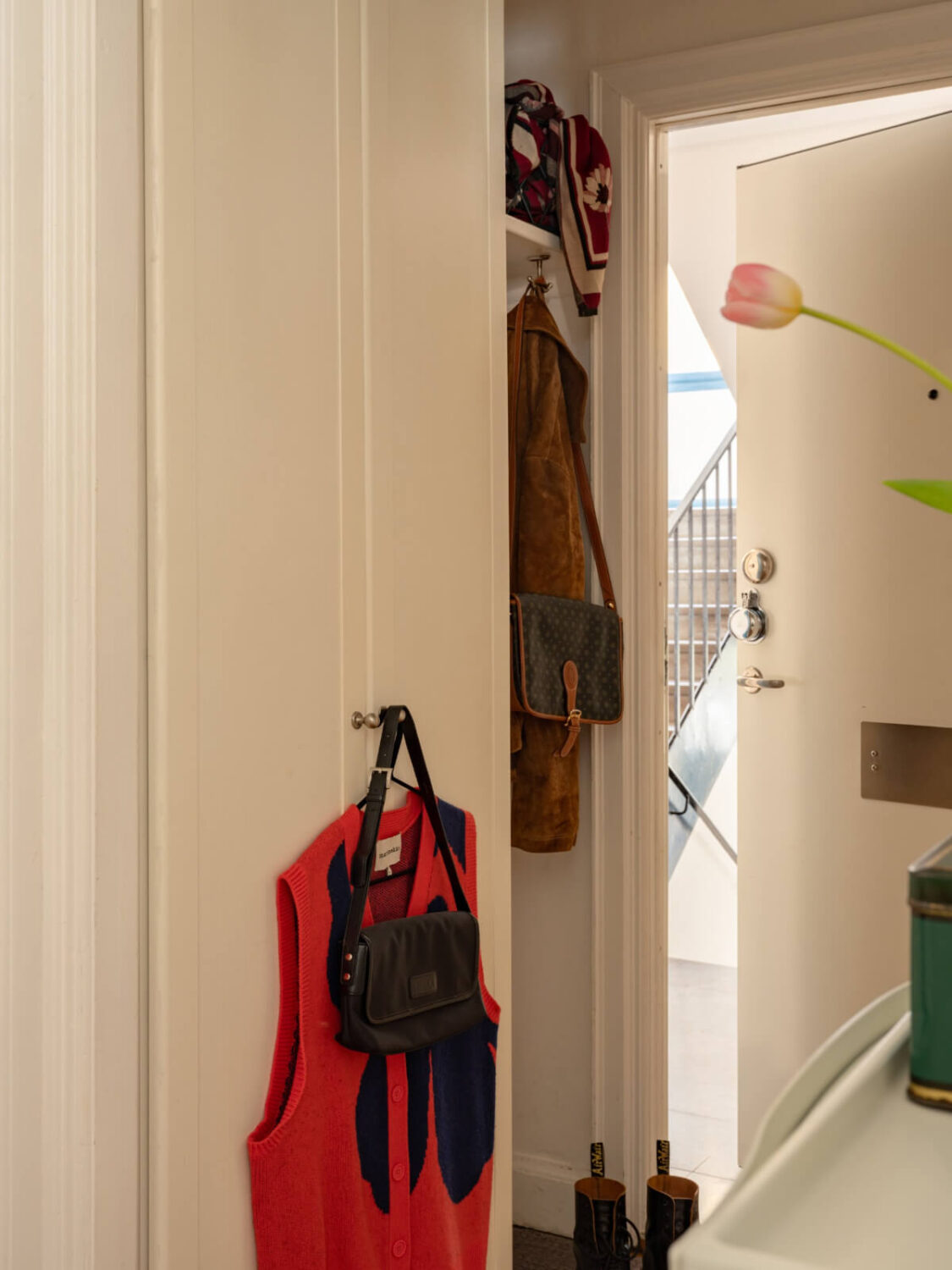 A Small, Cozy Apartment with Built-in Storage and Bookshelves 20 hall built in wardrobes small niche for coats and shoes A Small, Cozy Apartment with Built-in Storage and Bookshelves