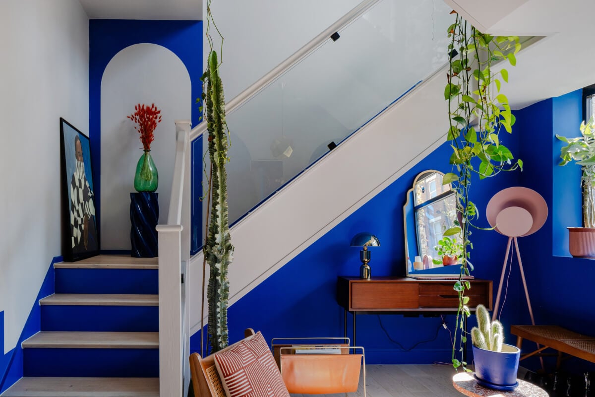 Arched Shapes and Hand-Painted Murals in a Joyful London Townhouse 6 hall cobalt blue walls