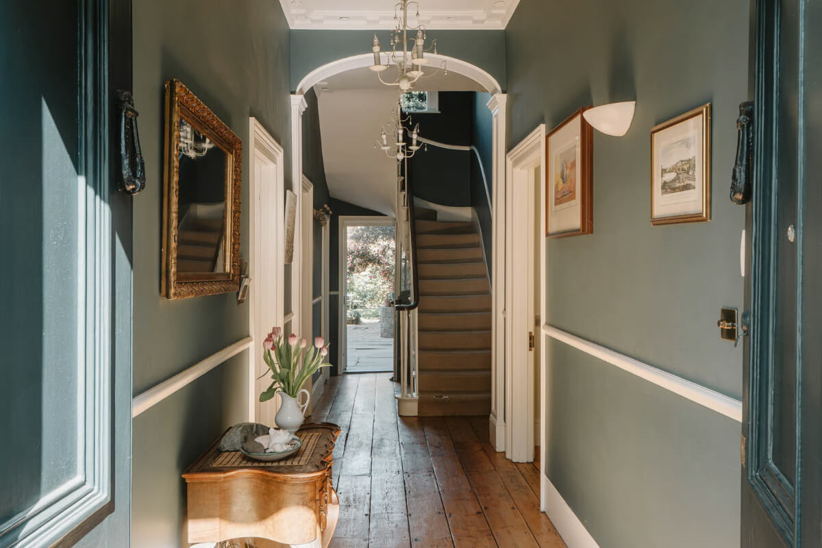 A Grand Regency-Style House with a Mature Garden in London 12 hall rustic floorboards arched doorway
